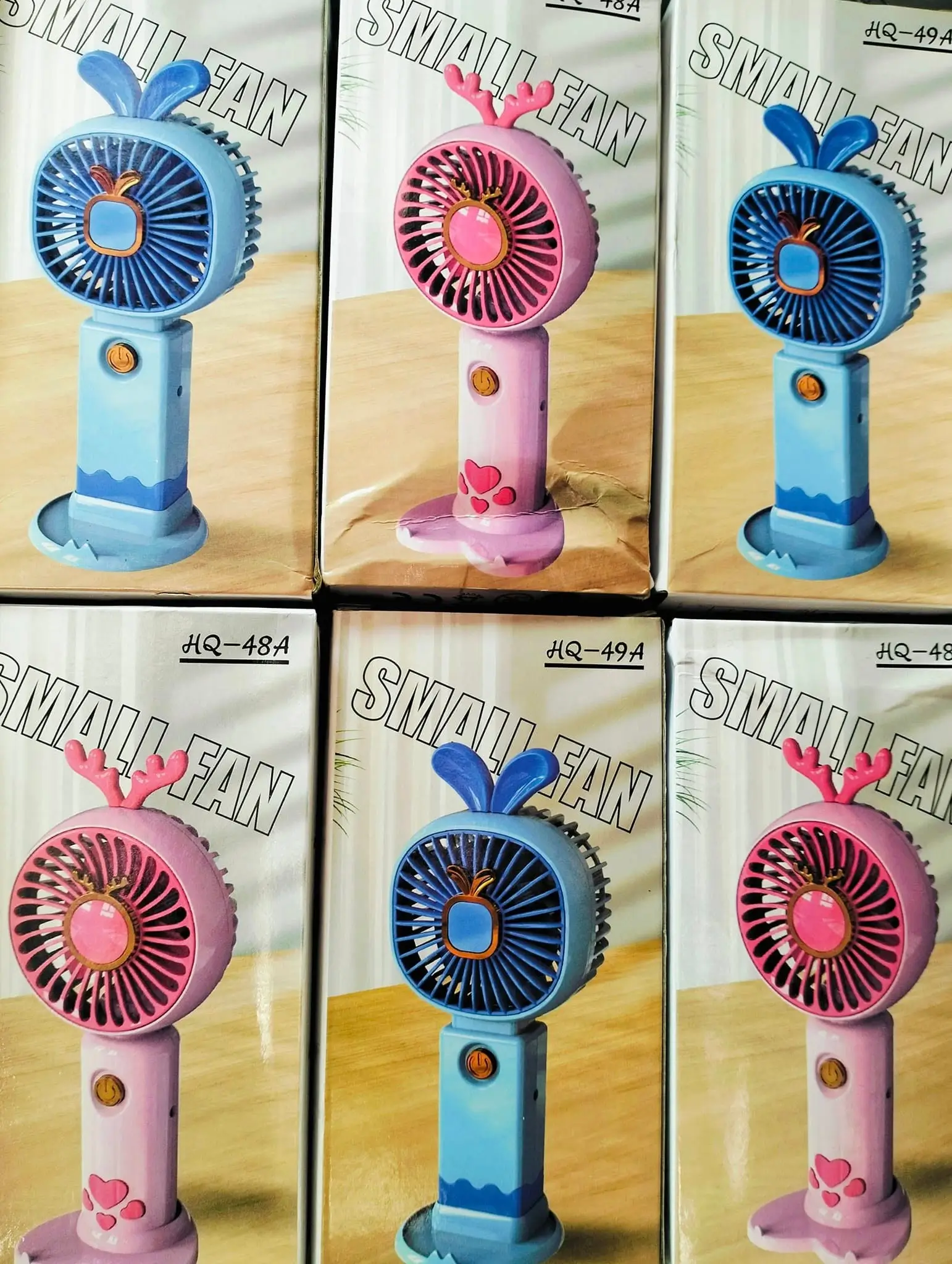 Portable handheld small fan with mobile holder- Multicolor